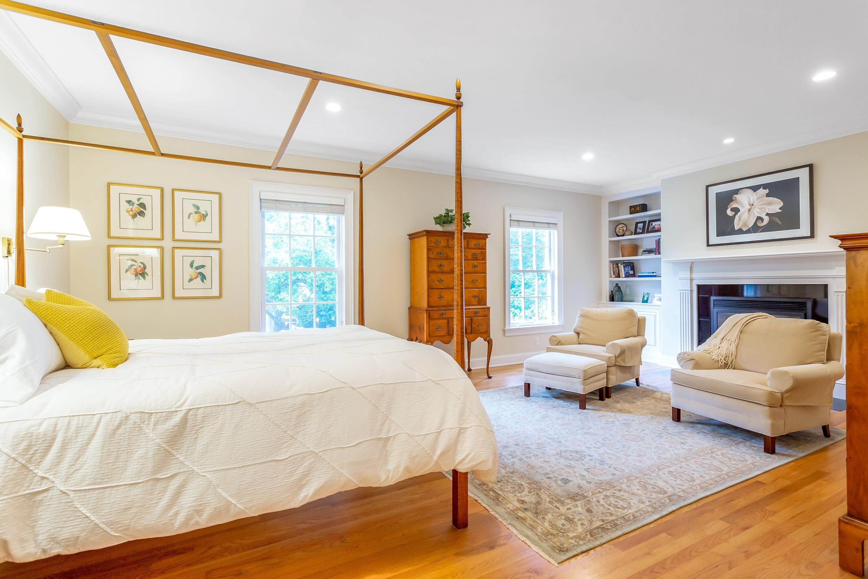 17 Harbor Road Darien, CT 06820 - Photo 17 of 41 a spacious bedroom with a bed couch and a window