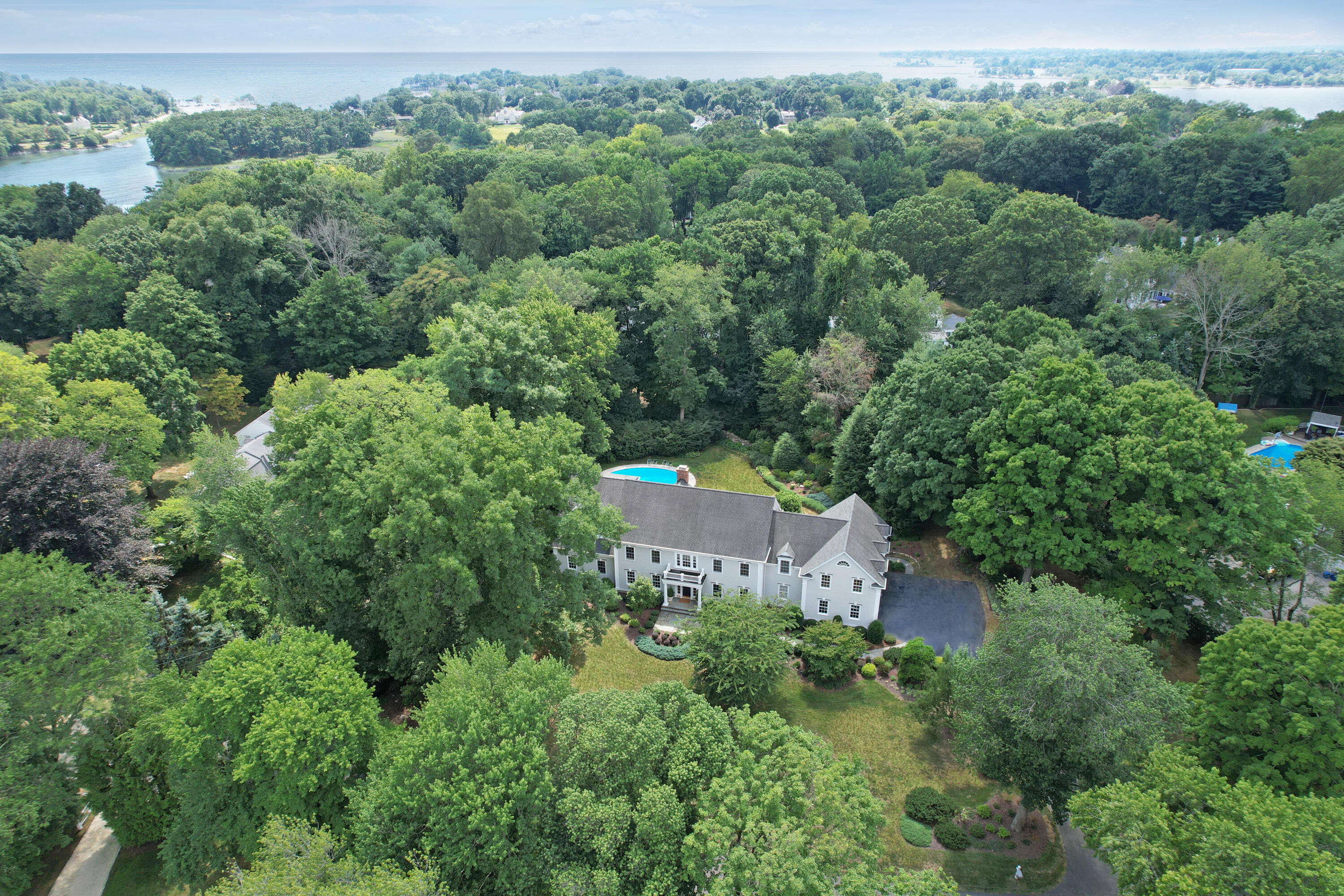 17 Harbor Road Darien, CT 06820 - Photo 3 of 41 an aerial view of a house with a yard