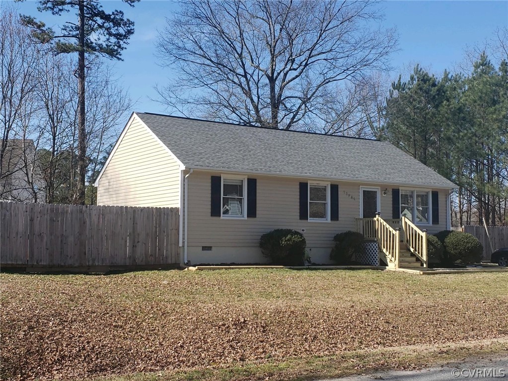 a house that has a tree in front of it