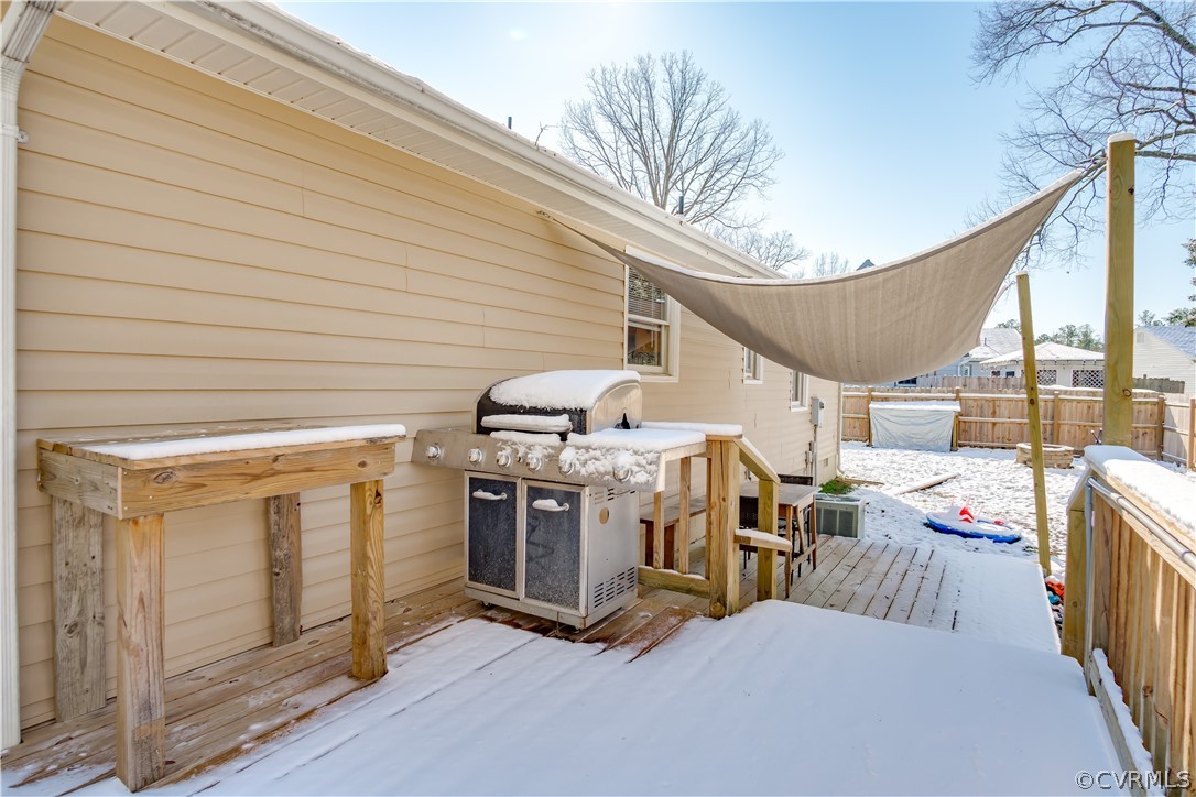 15948 Sandwave Road Chester, VA 23831 - Photo 19 of 22 a view of a patio with table and chairs