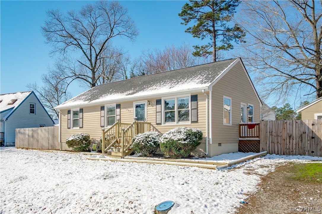 15948 Sandwave Road Chester, VA 23831 - Photo 3 of 22 a front view of a house with a yard and potted plants