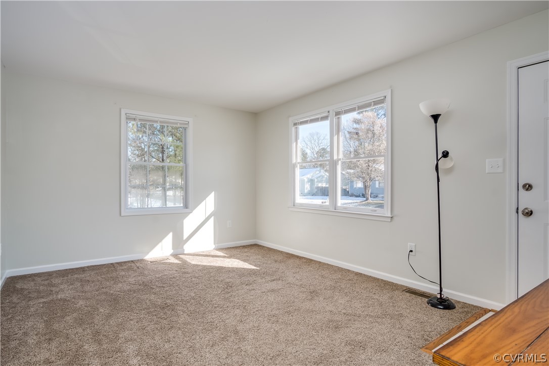 15948 Sandwave Road Chester, VA 23831 - Photo 7 of 22 a view of a room with window