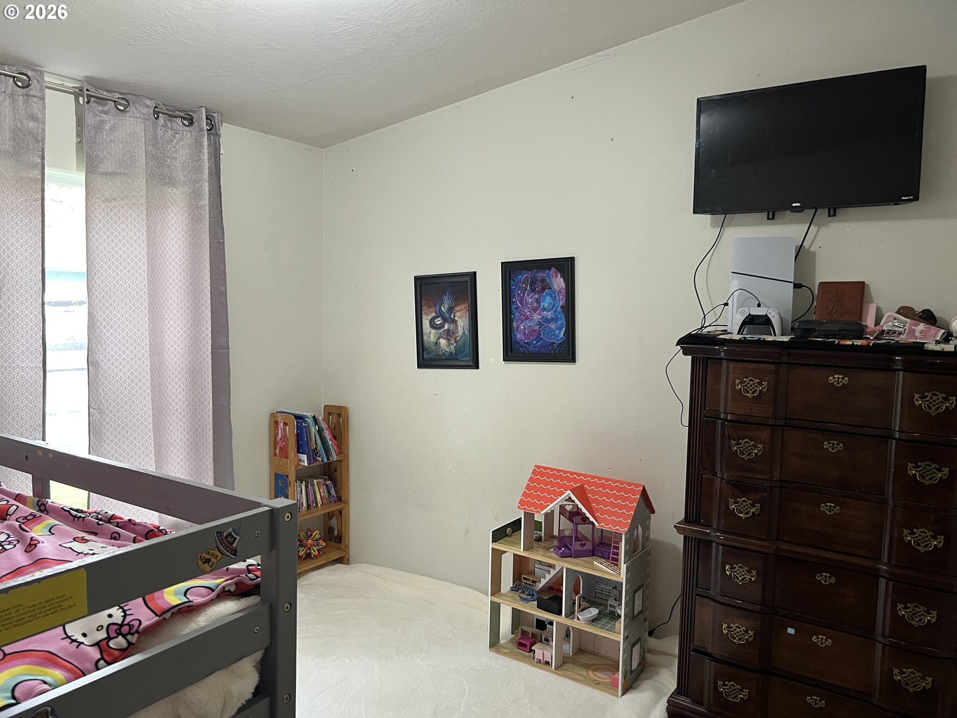 210 Northwest Grinstead Street Siletz, OR 97380 - Photo 22 of 29 a room with furniture and flat screen tv