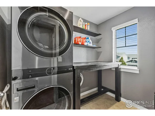 a kitchen with a sink and a stove