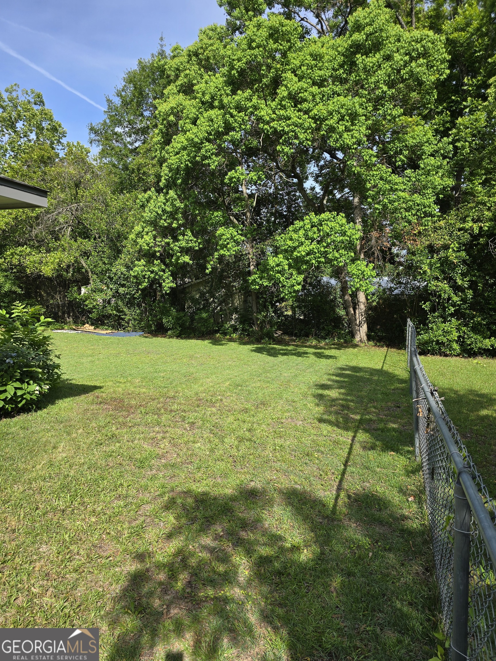 108 Sunset Drive Eufaula, AL 36027 - Photo 12 of 12 a view of a field with a tree