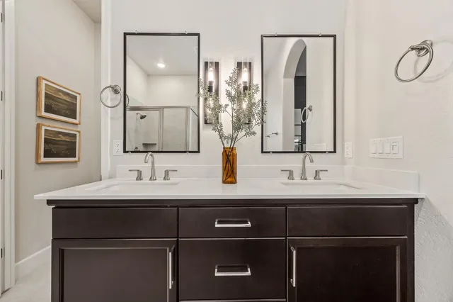 a bath room with a bath tub and a shower