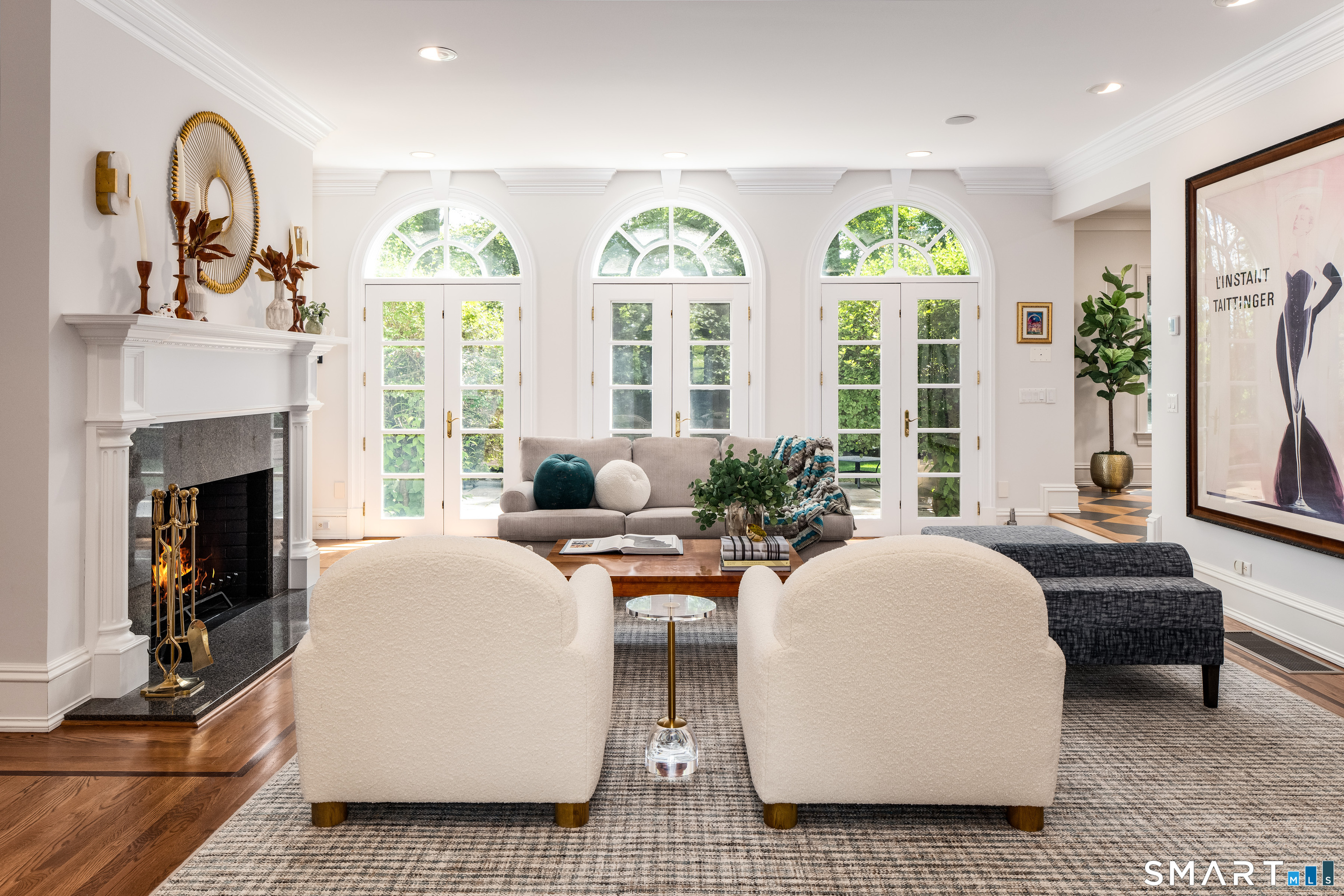 760 Smith Ridge Road New Canaan, CT 06840 - Photo 3 of 40 a living room with fireplace furniture and a large window