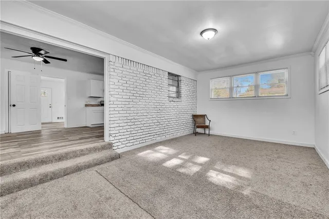 a view of a livingroom with a staircase