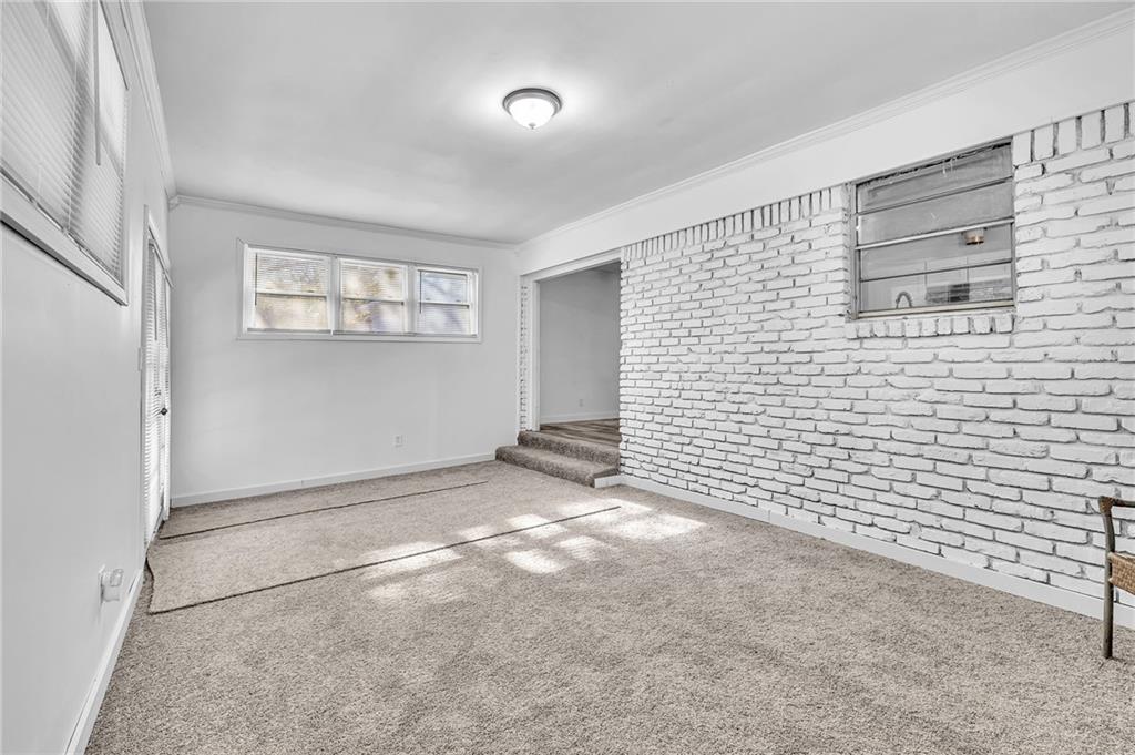 2356 County Line Road Southwest Atlanta, GA 30331 - Photo 16 of 22 a view of a livingroom with an empty space and window