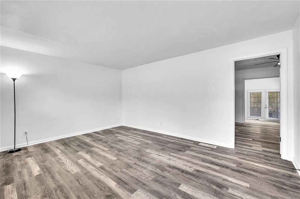 2356 County Line Road Southwest Atlanta, GA 30331 - Photo 8 of 22 a view of empty room with wooden floor