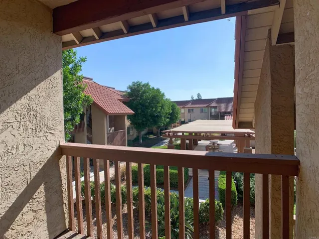 a view of a balcony with an outdoor space