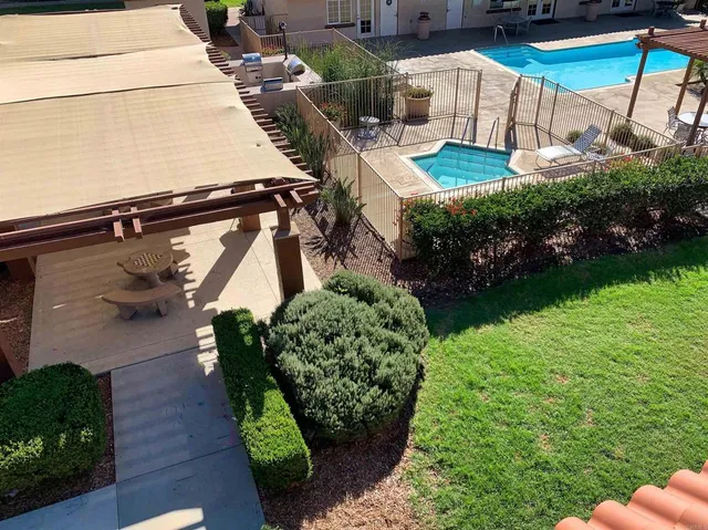 a view of a backyard with plants