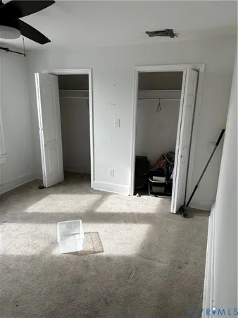 a view of livingroom with furniture and closet