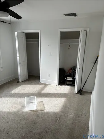 a view of livingroom with furniture and closet