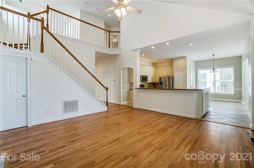 3233 Colonel Springs Way Fort Mill, SC 29708 - Photo 11 of 48 a view of a kitchen with wooden floor and electronic appliances