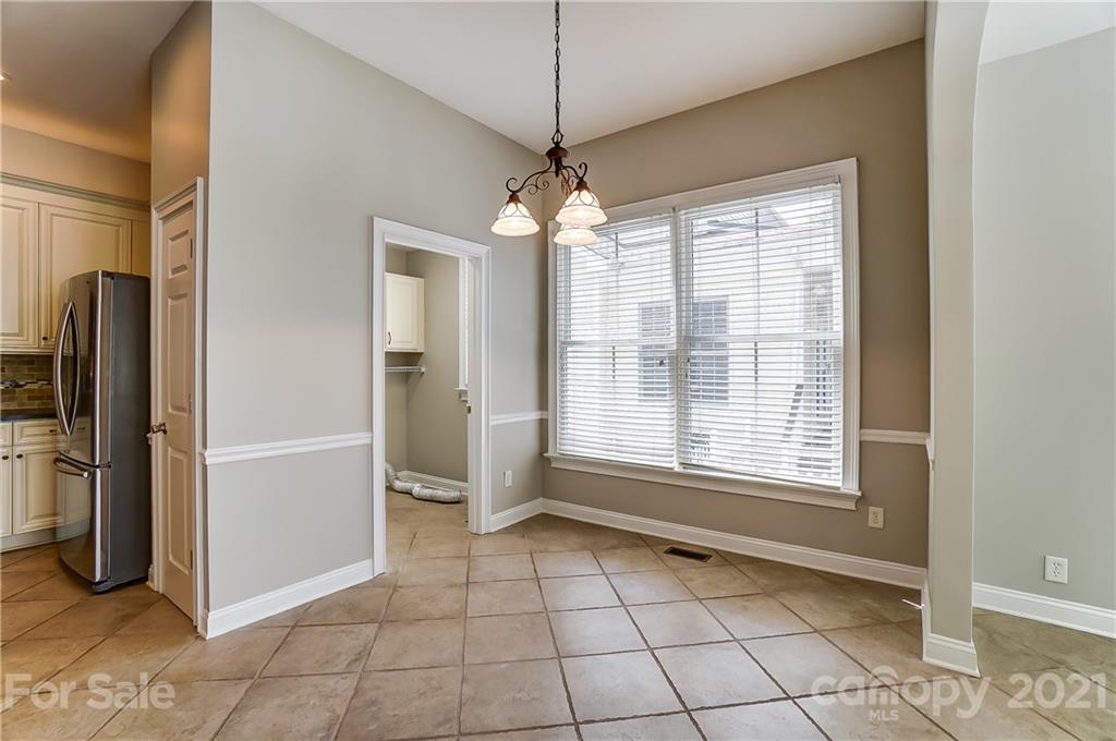 3233 Colonel Springs Way Fort Mill, SC 29708 - Photo 18 of 48 a view of an empty room with a window