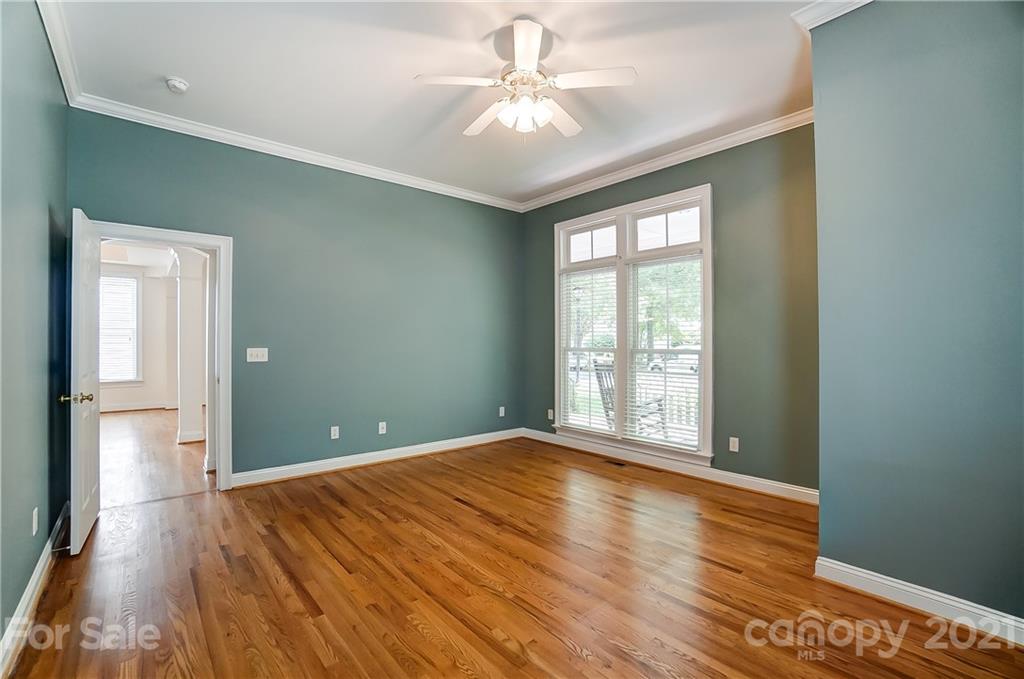 3233 Colonel Springs Way Fort Mill, SC 29708 - Photo 26 of 48 a view of an empty room with window and wooden floor