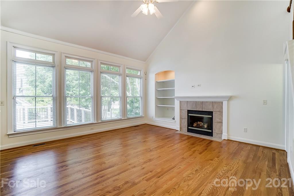 3233 Colonel Springs Way Fort Mill, SC 29708 - Photo 8 of 48 wooden floor fireplace and natural light in room