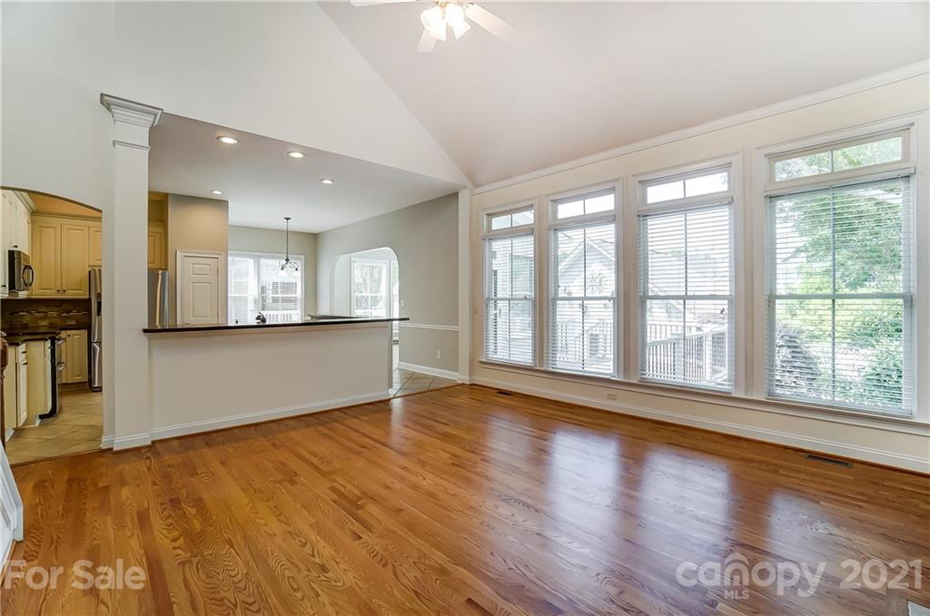 3233 Colonel Springs Way Fort Mill, SC 29708 - Photo 9 of 48 a view of an empty room with window and wooden floor