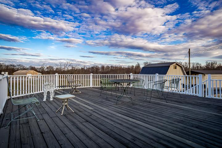 757 Robinson Ridge Road Baxter, TN 38544 - Photo 20 of 26 a view of a balcony with wooden floor