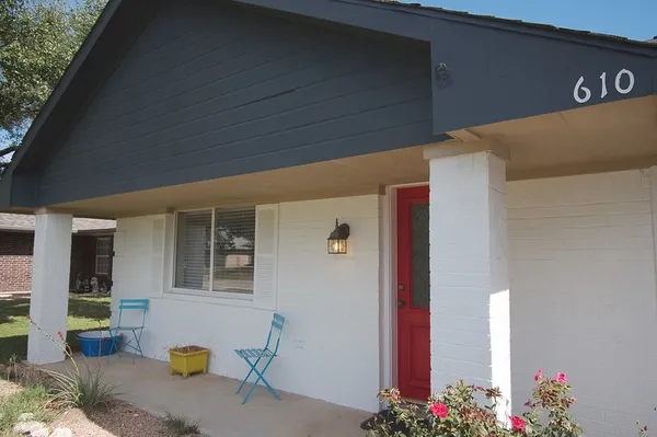 a front view of a house with an outdoor space