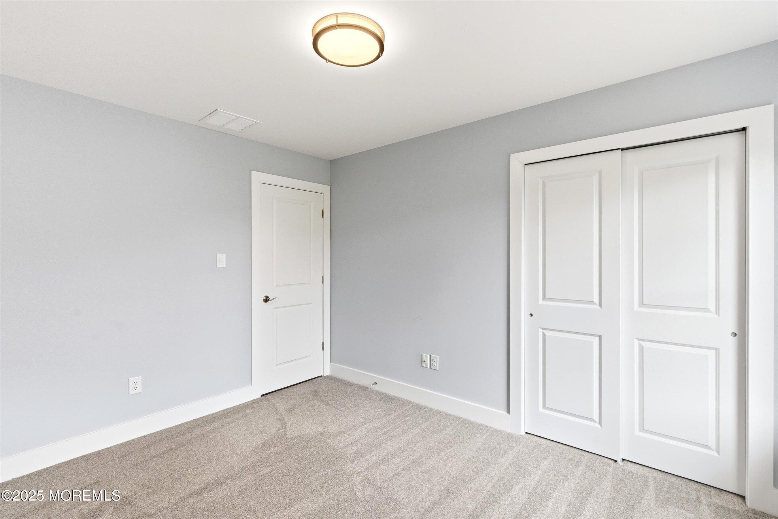 169 Davis Station Road Cream Ridge, NJ 08514 - Photo 39 of 57 an empty room with a empty space