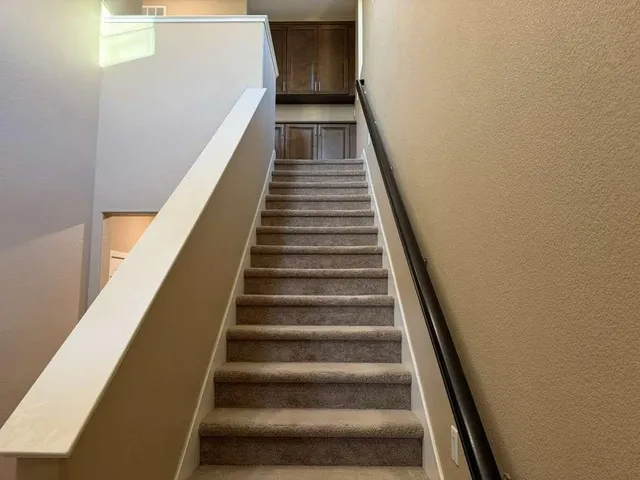 a view of a room that has a window in it