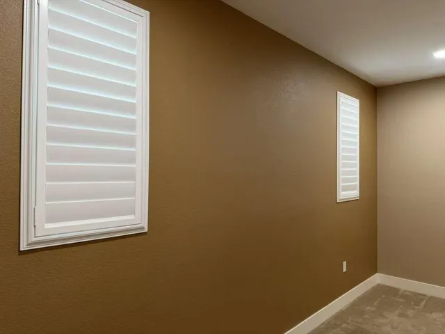 an empty room with a door