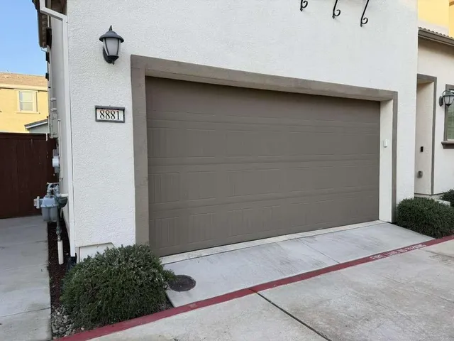 a view of a door and a window