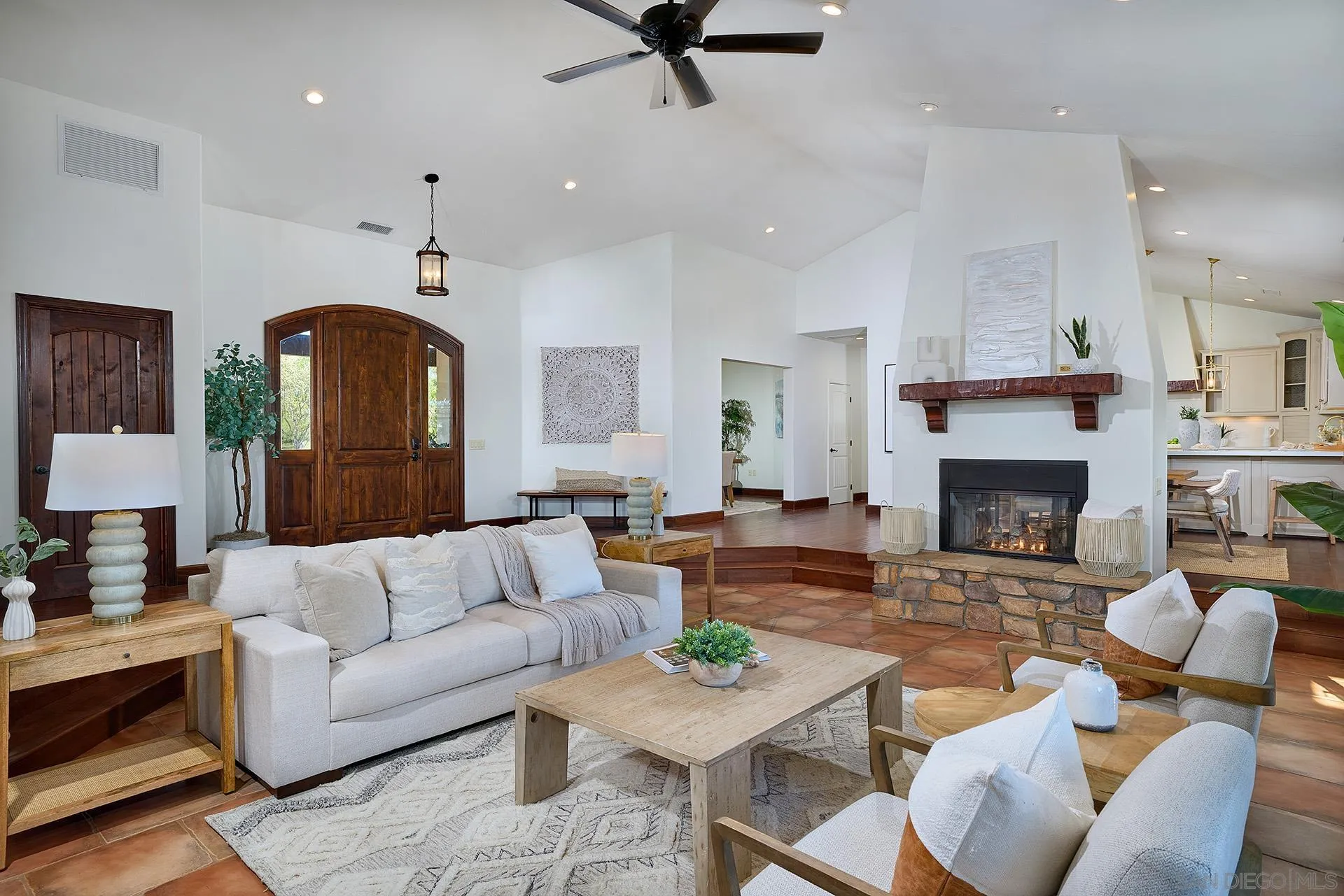 38408 Mesa Road Temecula, CA 92592 - Photo 13 of 57 a living room with furniture fireplace and a fireplace