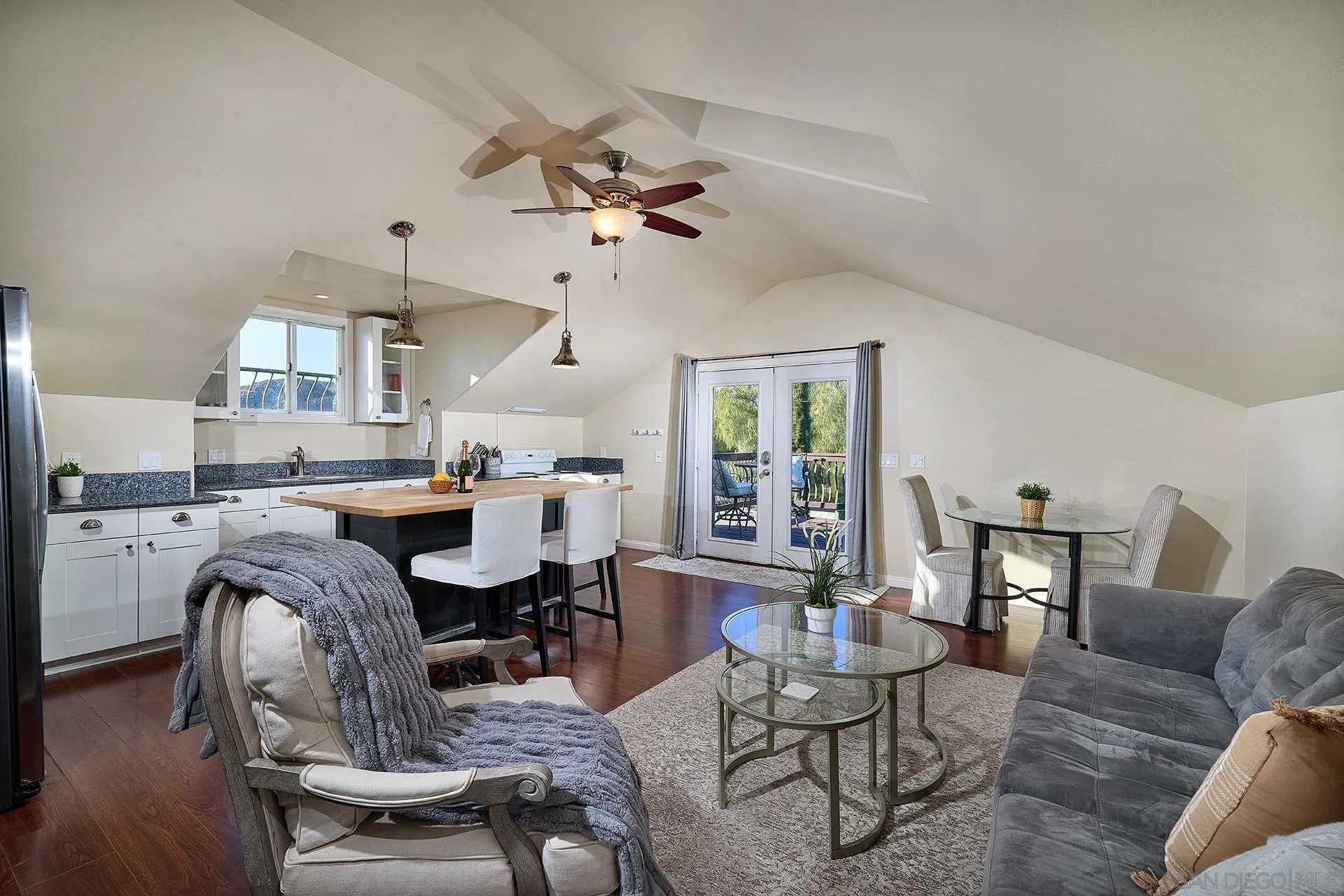 38408 Mesa Road Temecula, CA 92592 - Photo 30 of 57 a living room with furniture and a chandelier