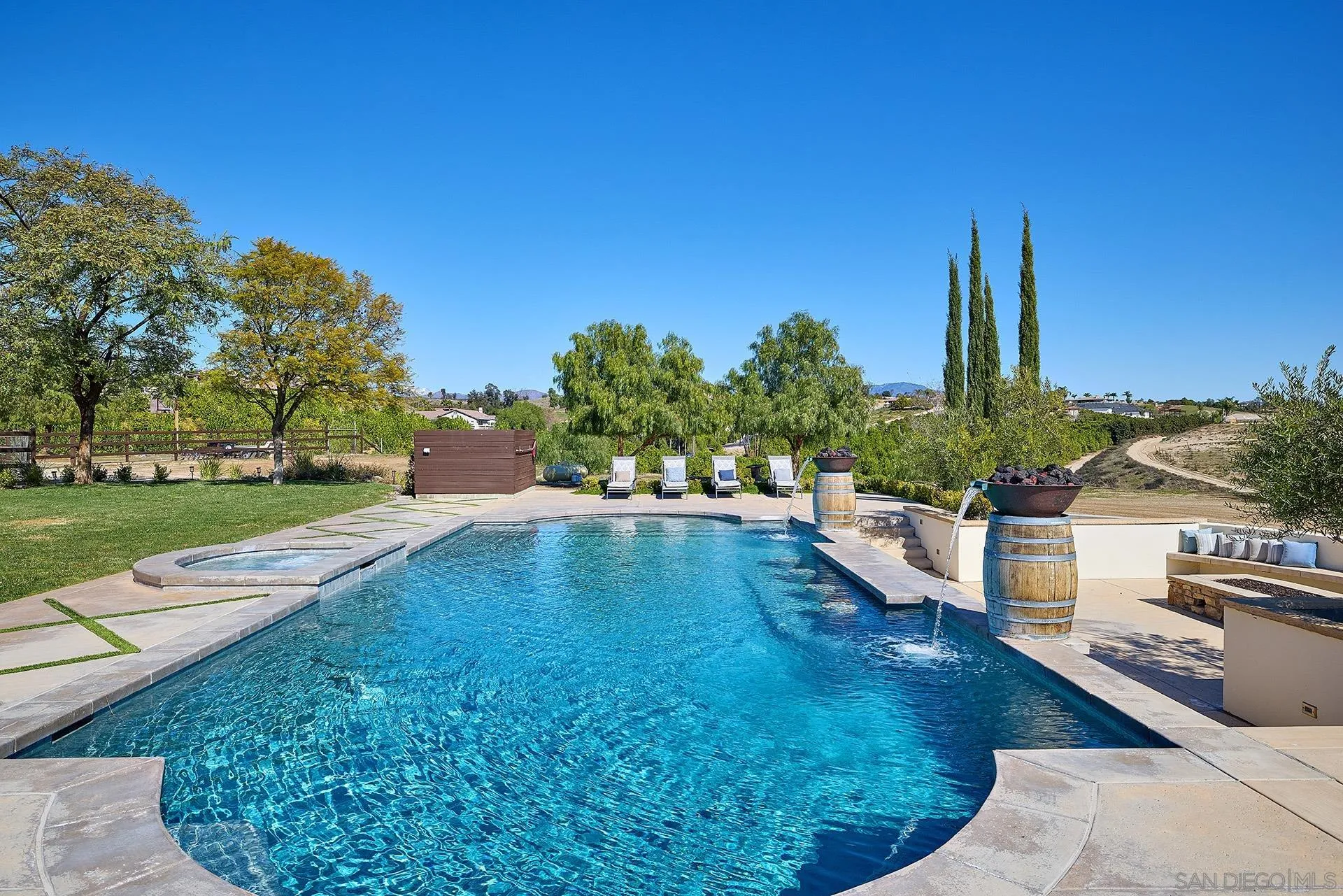 38408 Mesa Road Temecula, CA 92592 - Photo 45 of 57 a view of a swimming pool with a patio