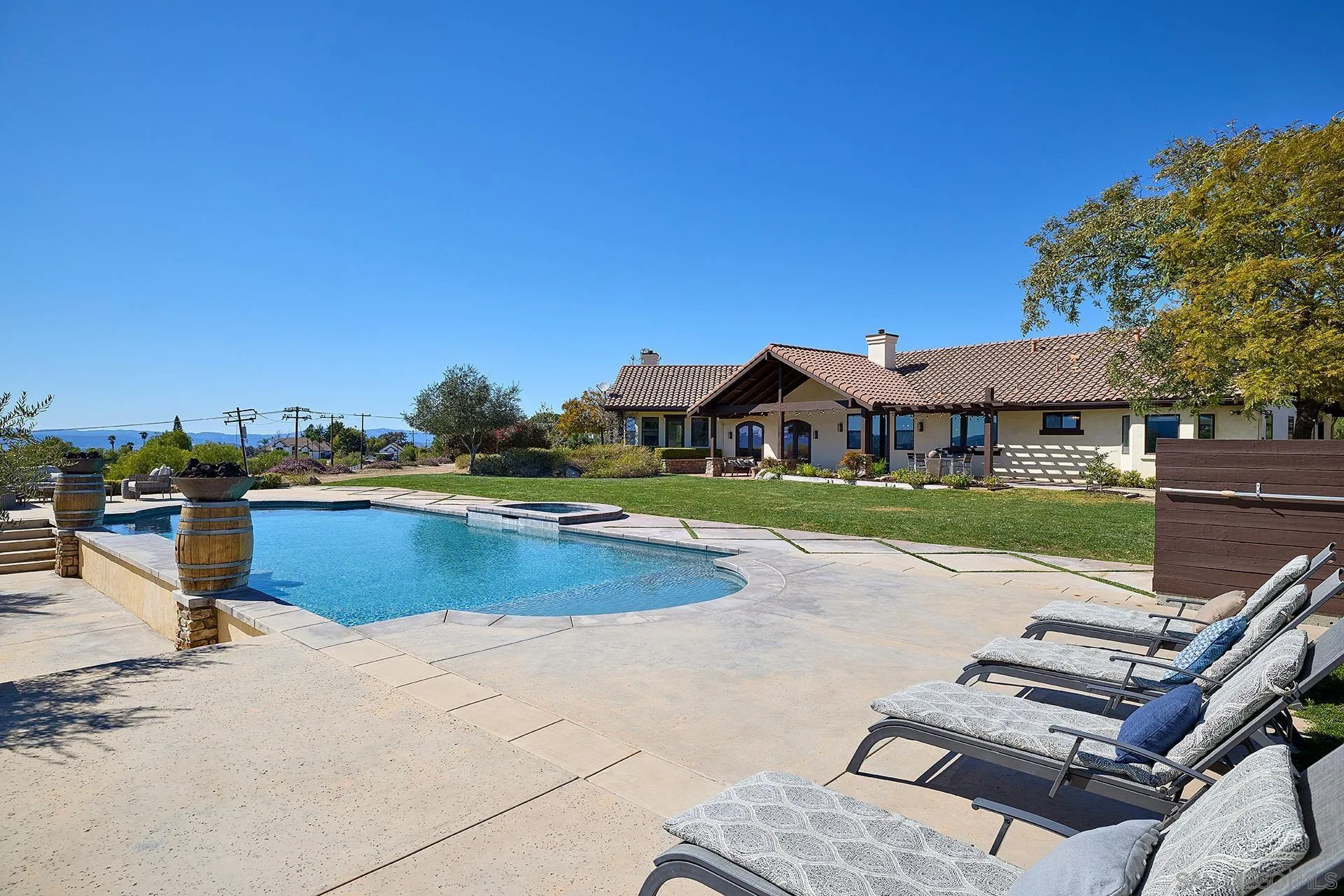 38408 Mesa Road Temecula, CA 92592 - Photo 46 of 57 a view of swimming pool with outdoor seating and yard
