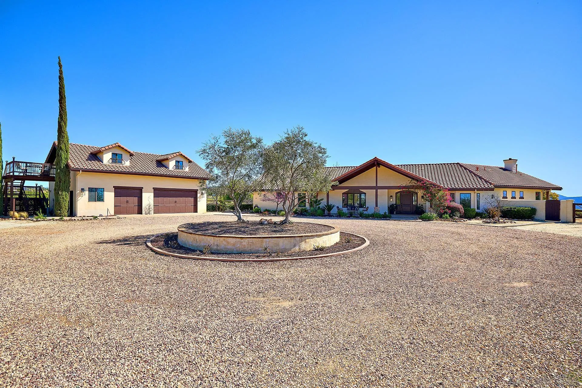 38408 Mesa Road Temecula, CA 92592 - Photo 49 of 57 a front view of a house with a yard
