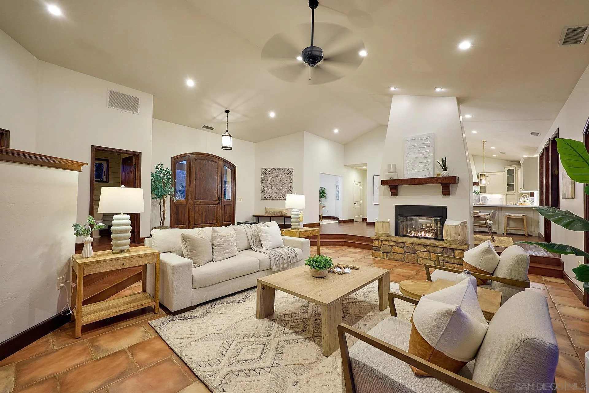 38408 Mesa Road Temecula, CA 92592 - Photo 7 of 57 a living room with furniture fireplace and a view