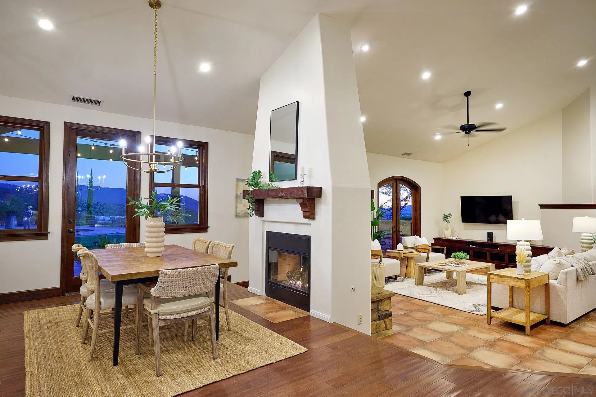 38408 Mesa Road Temecula, CA 92592 - Photo 8 of 57 a living room with furniture a fireplace and a flat screen tv