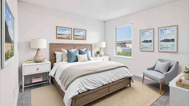 a spacious bedroom with a bed and a window