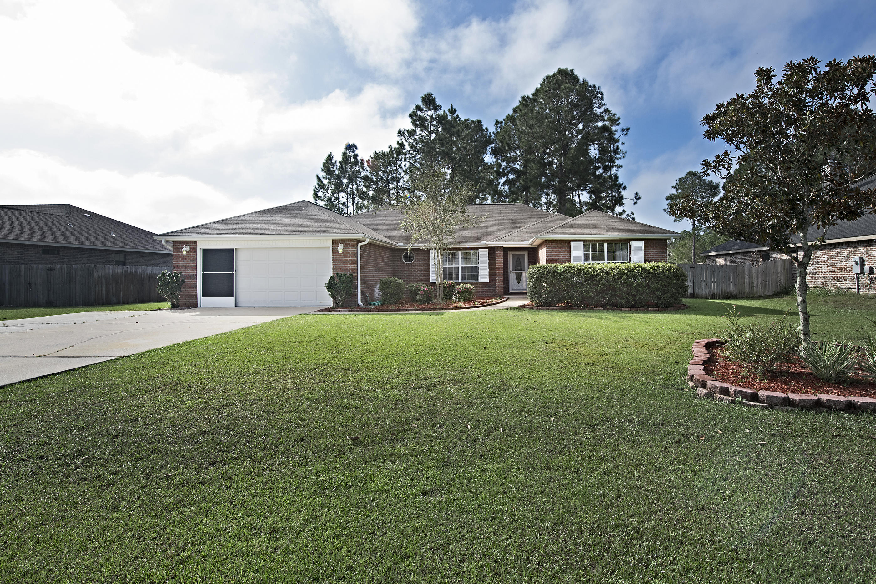 7583 Woodmont Road Navarre, FL 32566 - Photo 1 of 38 Gallery Image 1