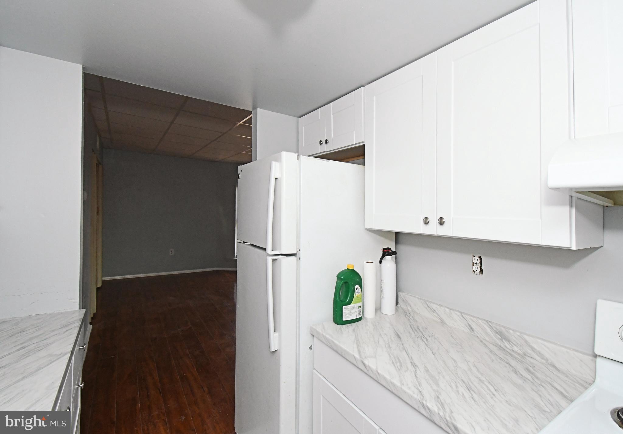 608 Easton Road Willow Grove, PA 19090 - Photo 6 of 10 a kitchen with a refrigerator and a stove top oven