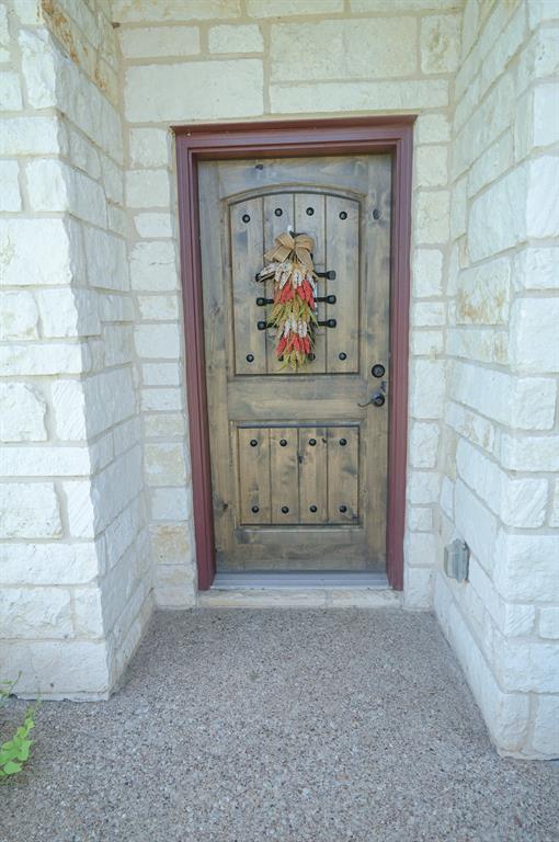 617 Mesquite Tree Road Waco, TX 76705 - Photo 18 of 39 a view of wooden door with glass door
