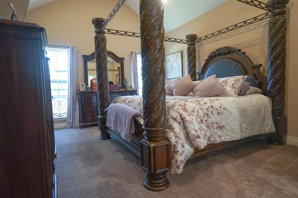 617 Mesquite Tree Road Waco, TX 76705 - Photo 21 of 39 a bed sitting in a bedroom next to a window