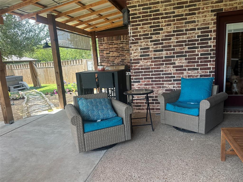 617 Mesquite Tree Road Waco, TX 76705 - Photo 36 of 39 a view of a patio with couches chairs and a fire pit