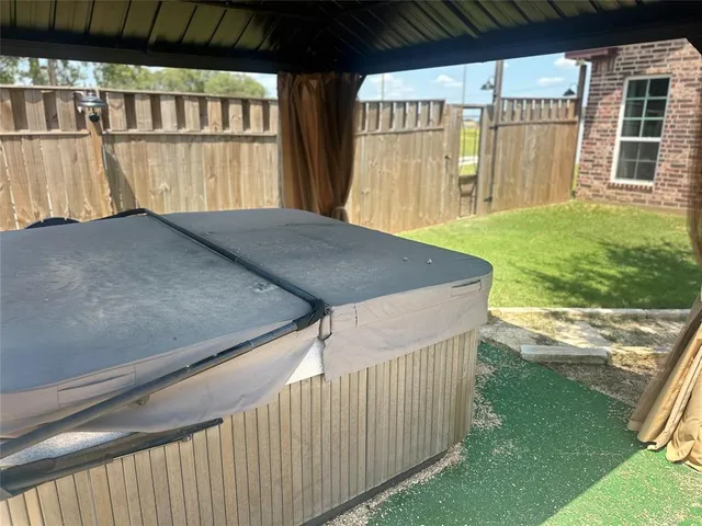 a view of backyard with green space