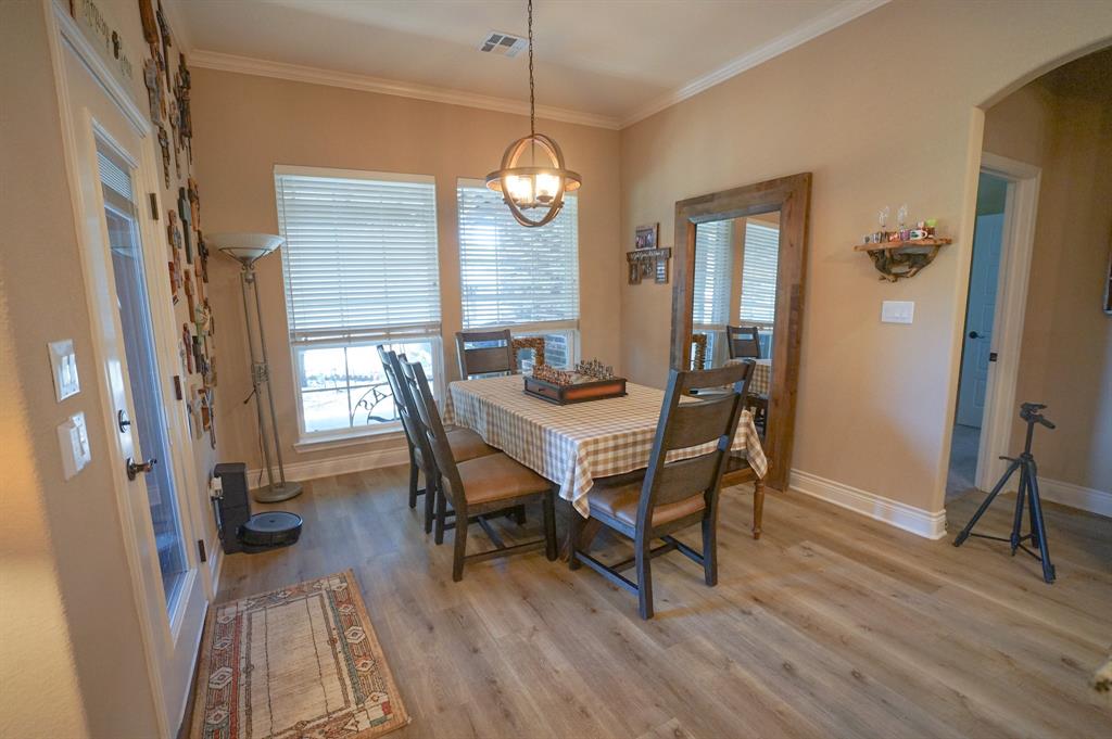 617 Mesquite Tree Road Waco, TX 76705 - Photo 10 of 39 a view of a dining room with furniture window and wooden floor