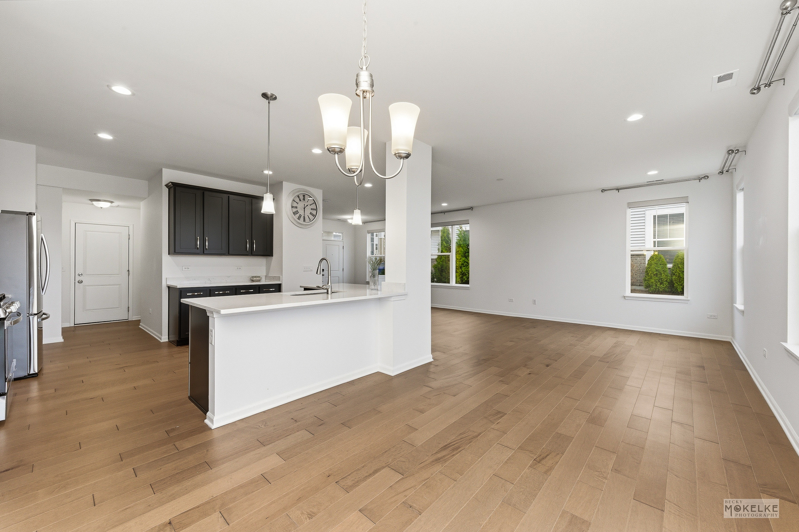4184 Calder Lane Aurora, IL 60504 - Photo 12 of 35 a view of a kitchen with kitchen island a sink stainless steel appliances and cabinets