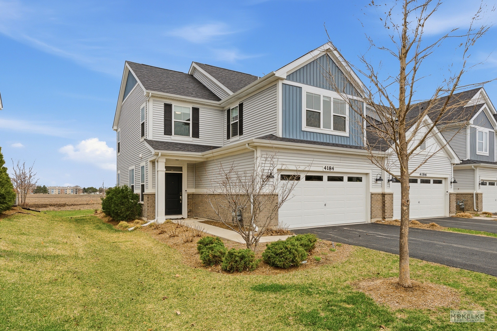 4184 Calder Lane Aurora, IL 60504 - Photo 2 of 35 a front view of a house with a yard