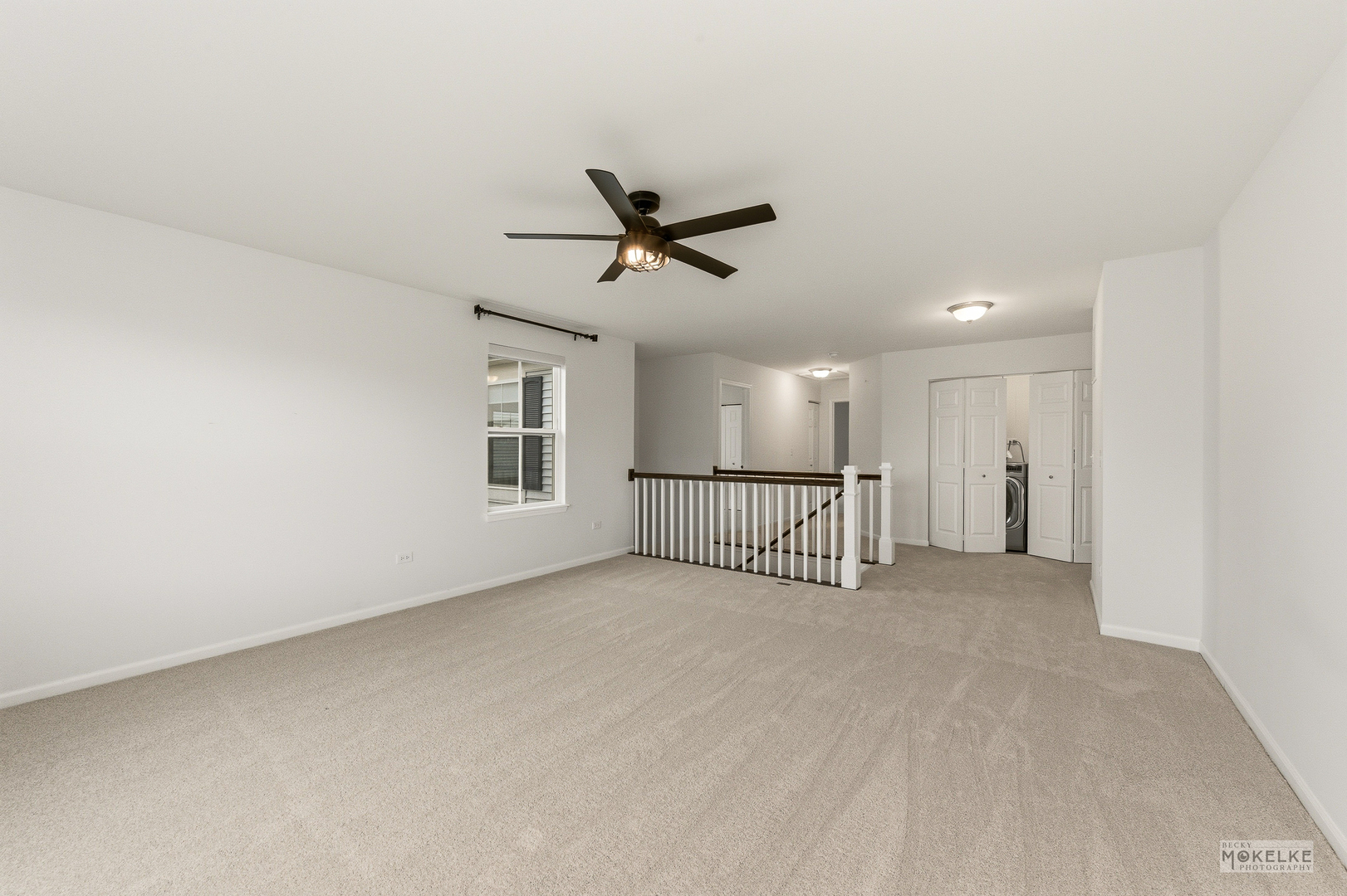 4184 Calder Lane Aurora, IL 60504 - Photo 21 of 35 a view of a livingroom with a ceiling fan and window