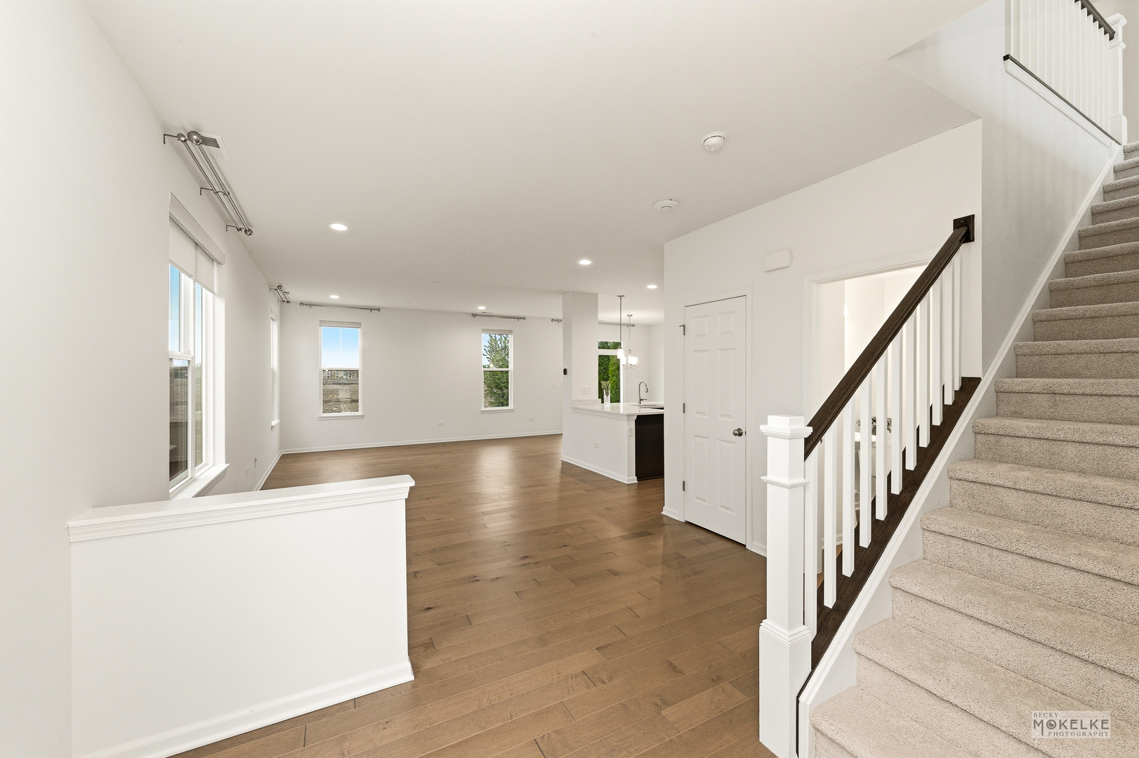 4184 Calder Lane Aurora, IL 60504 - Photo 3 of 35 a view of a livingroom with furniture staircase and a kitchen