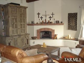 12222 Cloud Ridge Drive Tucson, AZ 85755 - Photo 7 of 10 a living room with furniture and a fireplace