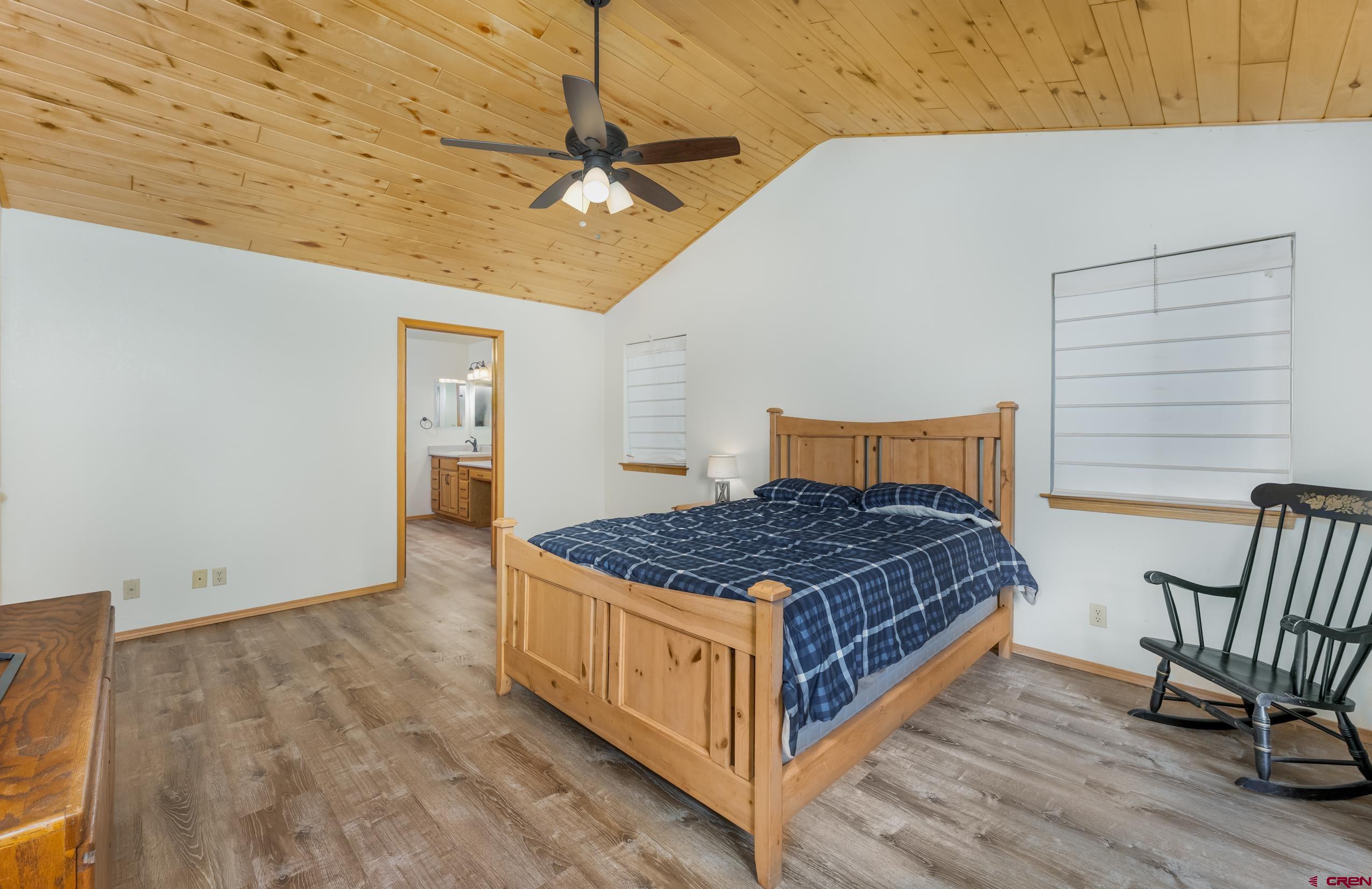 197 Buckhorn Road Bayfield, CO 81122 - Photo 16 of 34 a bedroom with a bed and window